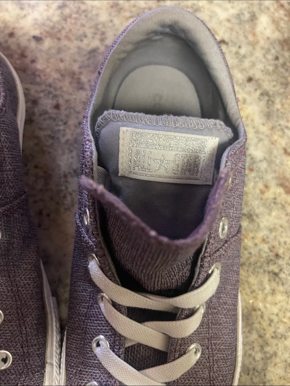 Converse Low-Top Canvas Sneakers in Dusty Plum with White Trim.